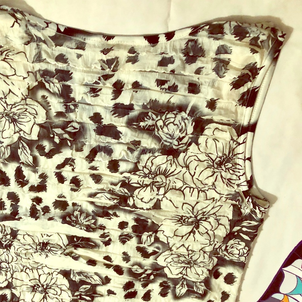 Lavish tank top with rose pattern.